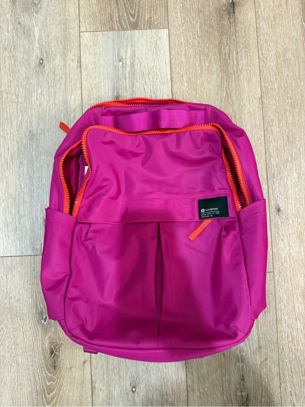 lululemon athletica Bright Magenta Backpack with Orange Trim